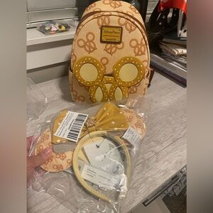 NWT Loungefly Disney Parks Pretzel backpack and matching ears.